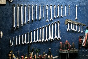 Mechanic tools hanging on a wall | PA-Cents