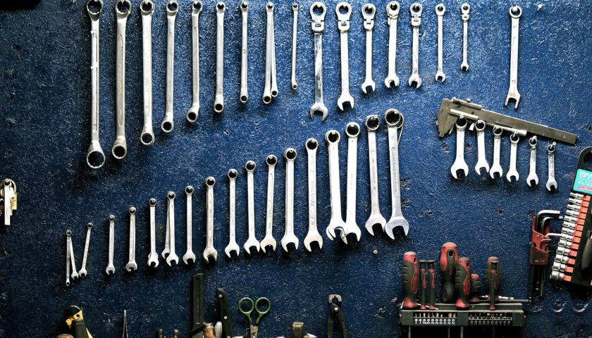 Mechanic tools hanging on a wall | PA-Cents