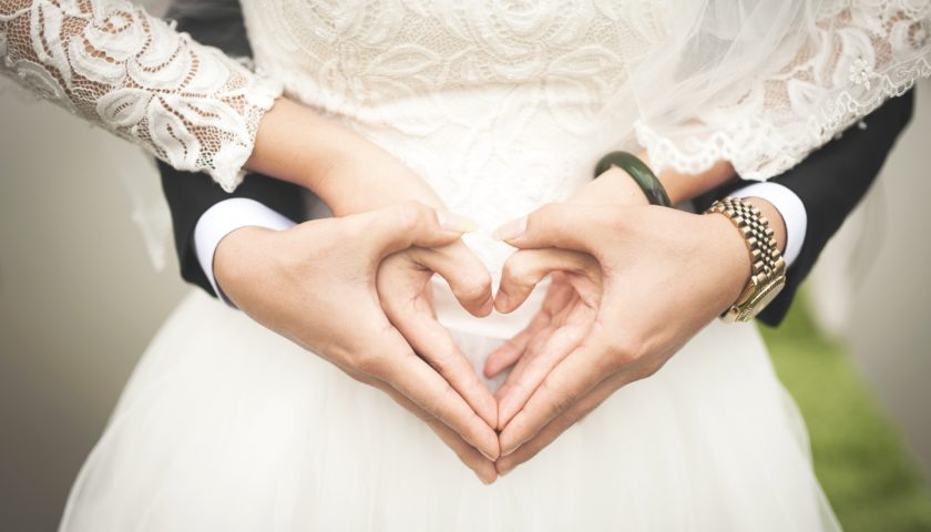 wedding photo of hands in a heart shape