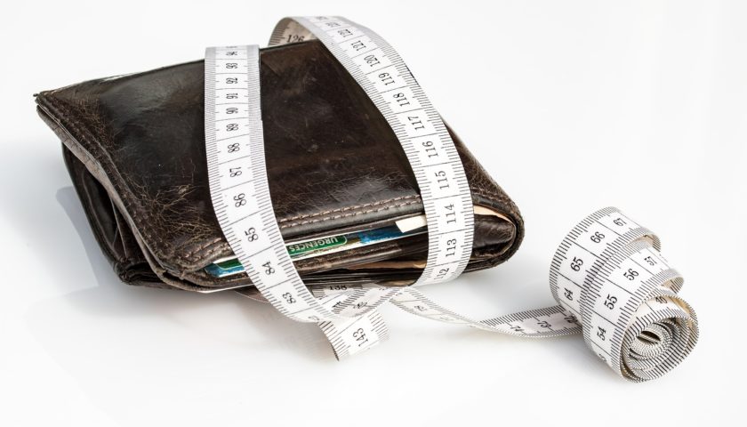 Wallet and measuring tape