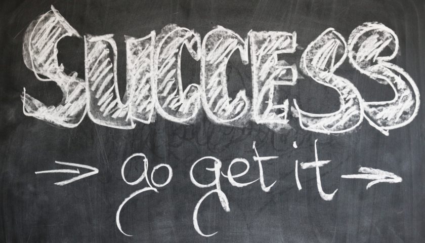 "success go get it" written on chalk board.
