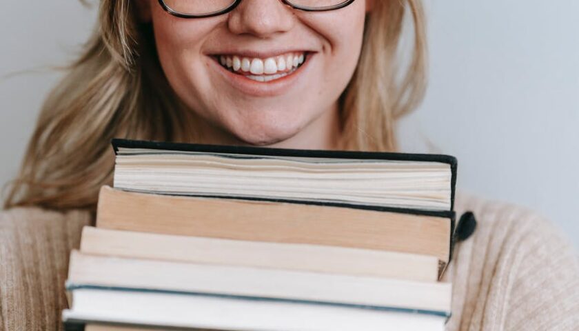 woman student book library